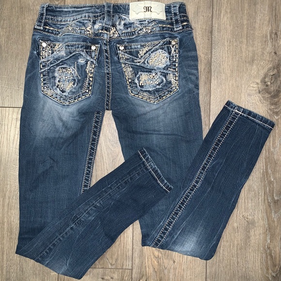 ripped miss me jeans